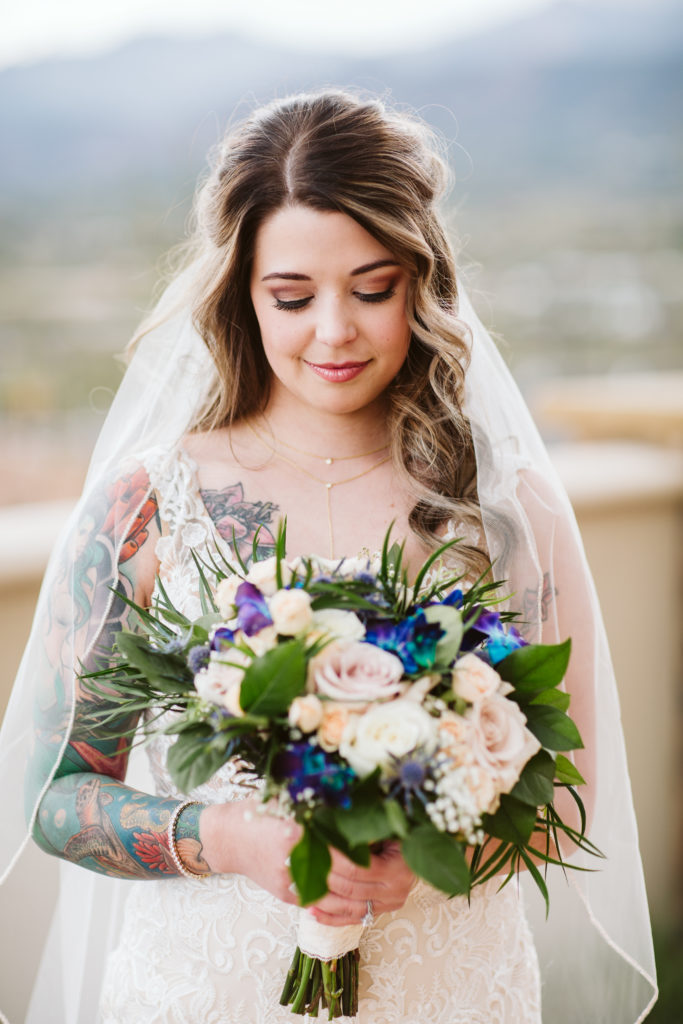 Bride holding non-traditional wedding bouquet