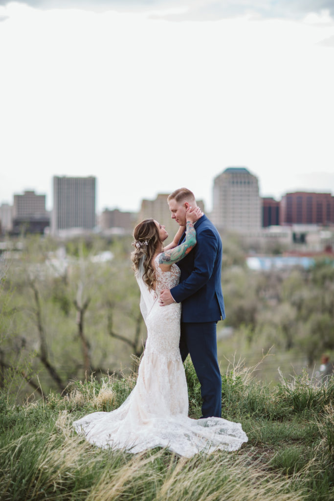 Wedding couple with Colorado skyline outdoors